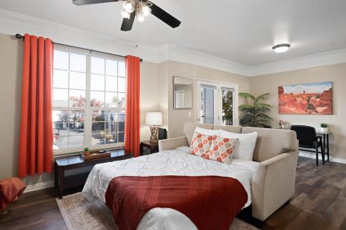 a bedroom with a bed and a large window at Relaxing Place Close to Skiing in Midvale