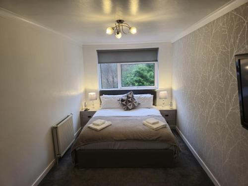 Ένα ή περισσότερα κρεβάτια σε δωμάτιο στο Seafield Crt, North Shore Beach