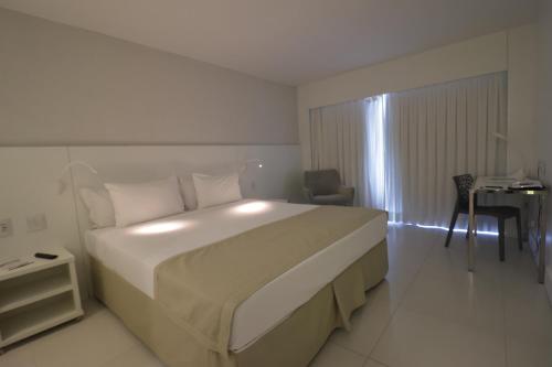Ein Bett oder Betten in einem Zimmer der Unterkunft CDesign Hotel