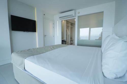 Ein Bett oder Betten in einem Zimmer der Unterkunft CDesign Hotel