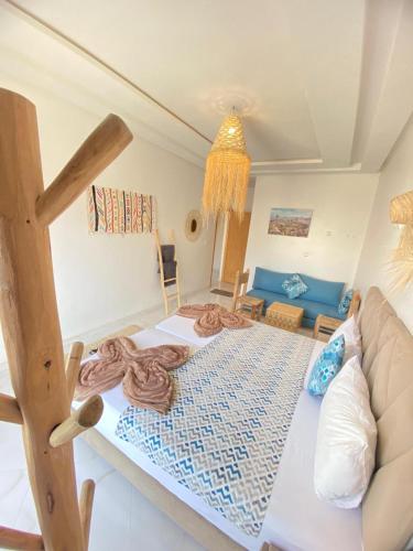 Postel nebo postele na pokoji v ubytování KAZA Moon Hostel