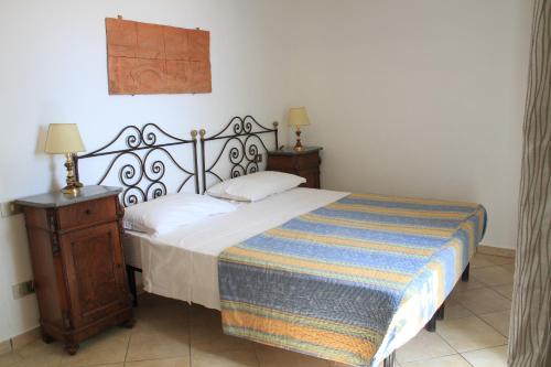 Ένα ή περισσότερα κρεβάτια σε δωμάτιο στο Agriturismo Le Pale