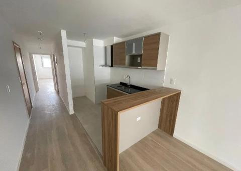 a kitchen with a counter top in a room at Apartamento in Montevideo