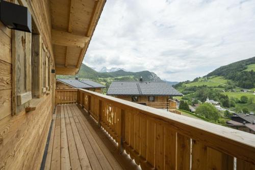 a balcony with a view of the mountains at AAF - Comfort Chalet Bergzeit in Forstau