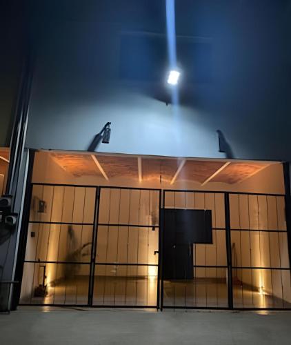 a building with a light on top of it at C7 Casas la colmena a 3 min playa alberca 4 rec, in Peñita de Jaltemba