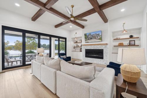 a living room with a couch and a fireplace at Luna's Lake Life in Terrell