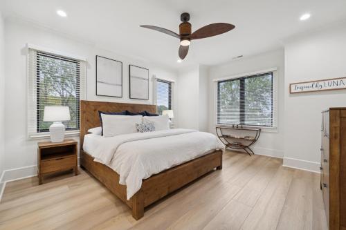 a bedroom with a bed and a ceiling fan at Luna's Lake Life in Terrell