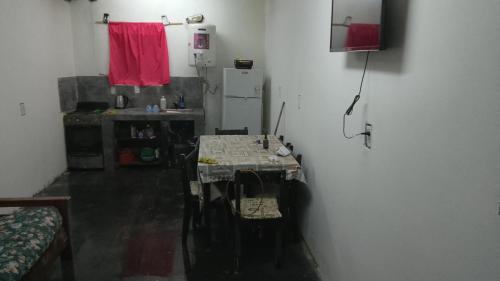 a room with a table in the corner of a room at Leo y Mar in Mar de Ajó