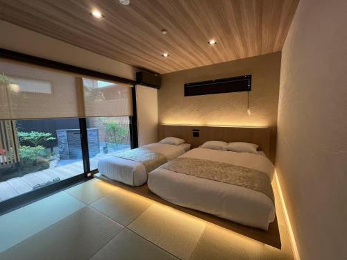 Katil atau katil-katil dalam bilik di Ume no Yu Takenoya - Vacation STAY 40917v
