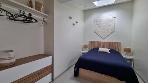 Ένα ή περισσότερα κρεβάτια σε δωμάτιο στο Opporak