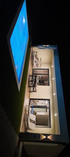an overhead view of a room with chairs and a window at Sunny Haven-Villa in Ponte de Lima