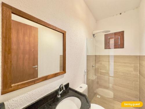 a bathroom with a sink and a toilet and a shower at Reserva BeachFront - Retirinho in Aracati