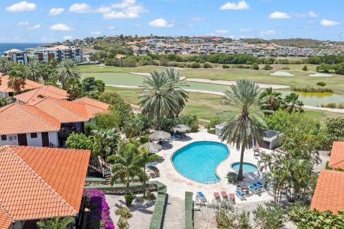 an aerial view of a resort with a swimming pool at Blue Bay Villa's in Blue Bay