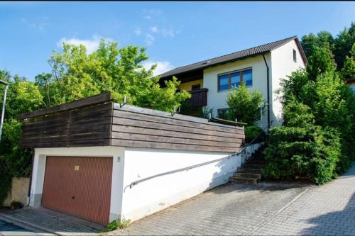 a house with a garage and a fence at Villa Viola 