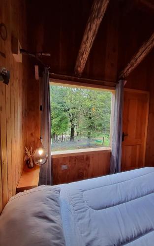 Postel nebo postele na pokoji v ubytování Refugio Salvatierra