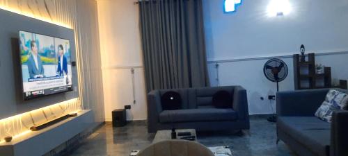 Posezení v ubytování Peters Service Apartment