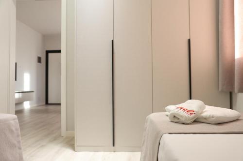 Ένα ή περισσότερα κρεβάτια σε δωμάτιο στο Meli Deluxe Apartments