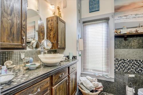 a bathroom with two sinks and a shower at Relax & Reboot 
