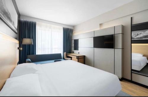 Postel nebo postele na pokoji v ubytování فنادق الوحدة محبس الجن