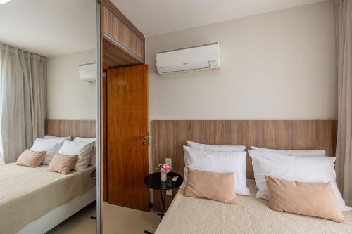 Postel nebo postele na pokoji v ubytování Férias na Praia - 2 Quartos em Cond Premium