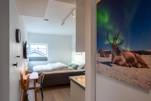 Postel nebo postele na pokoji v ubytování Aurora compact comfort