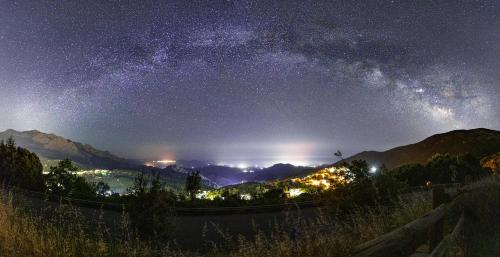 a starry night with the milky way in the sky at Sa Omu 'Eccia in Villagrande Strisaili