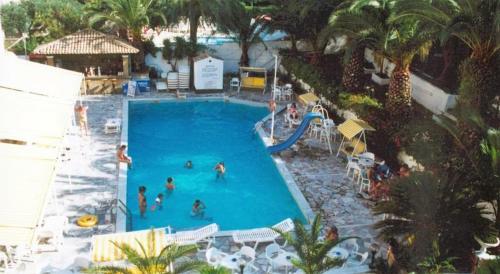 an overhead view of a swimming pool at a resort at Hotel Perama in Perama