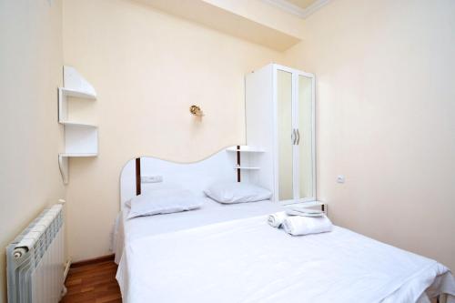 Llit o llits en una habitació de Teryan 68/3 2