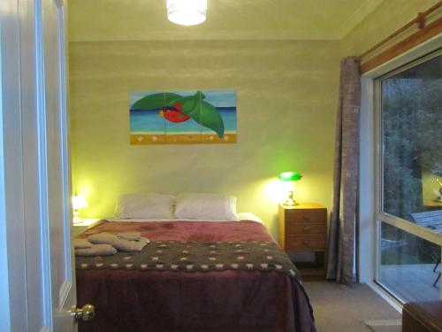 Ένα δωμάτιο στο Koromiko Cottage at Lochsloy Farmstay Little River