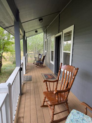 a porch with rocking chairs on a house at Tamarack Retreat Donnelly ID in McCall
