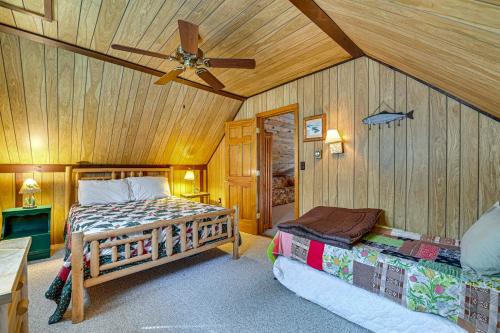 a bedroom with two beds and a ceiling fan at Waterfront Lake Pleasant Retreat with Private Dock in Lake Pleasant