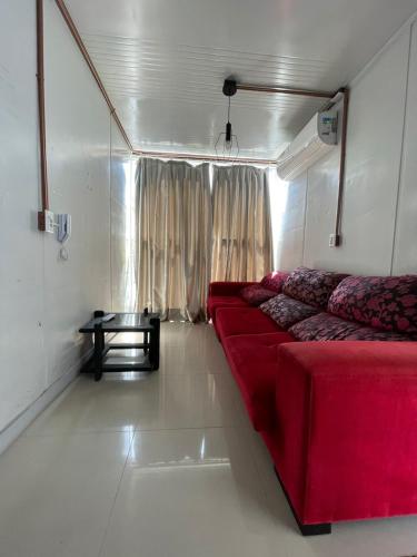 Ruang duduk di Apartamento 02 - Dois quartos, sala e cozinha