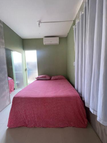 Katil atau katil-katil dalam bilik di Apartamento 02 - Dois quartos, sala e cozinha