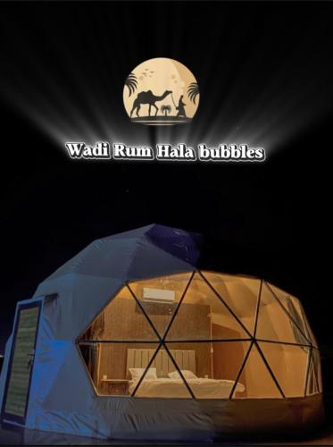 a tent with the words watch run haha buffalo at Wadi Rum, Hala bubbles in Wadi Rum