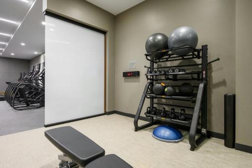 a room with a gym with a rack of exercise equipment at Courtyard by Marriott Pocatello in Pocatello