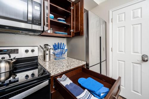 a kitchen with a stove and a counter top at Relaxing Place Close to Skiing in Midvale