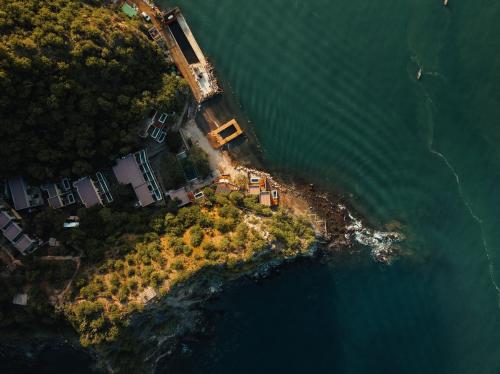 an aerial view of an island in the water at Perla Roca Hotel Boutique - Beach Front in Santa Marta