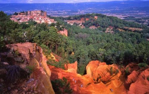 an aerial view of a mountain with trees and rocks at Au Romarin in Cavaillon