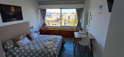 Ένα ή περισσότερα κρεβάτια σε δωμάτιο στο Centro cívico a 100 metros de distancia