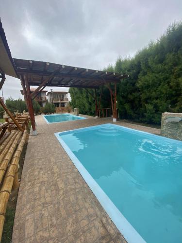 Kolam renang di atau dekat dengan Residencia en Huacho con piscina