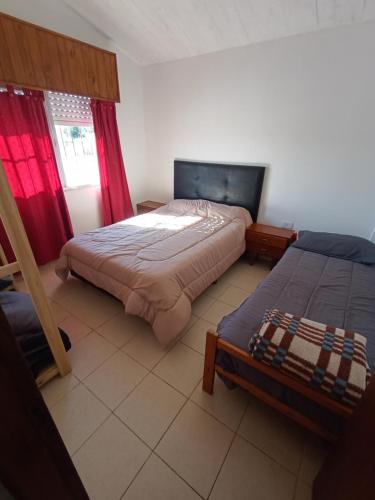 Postel nebo postele na pokoji v ubytování Cabaña tipo duplex La Tranquilidad