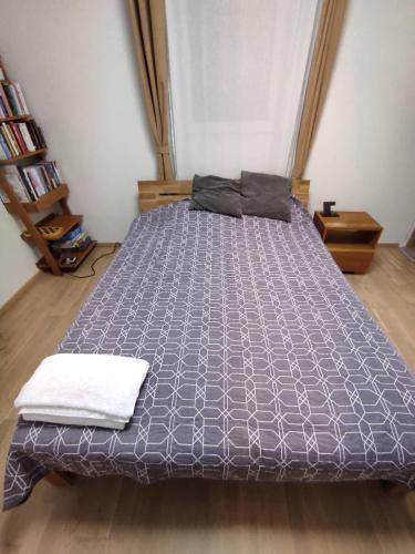 Un pat sau paturi într-o cameră la Paradise of Oliver