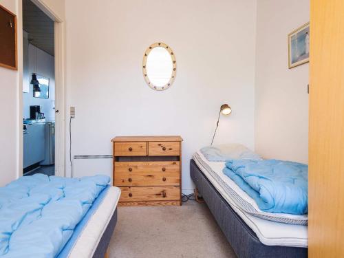 Ένα ή περισσότερα κρεβάτια σε δωμάτιο στο 4 person holiday home in Rømø-By Traum