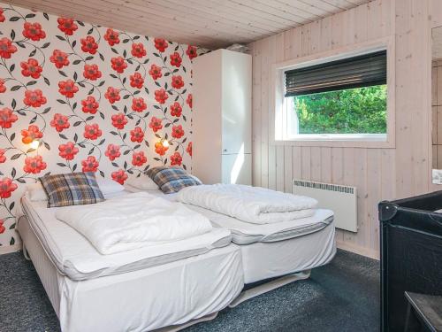 Postel nebo postele na pokoji v ubytování 6 person holiday home in Rømø-By Traum