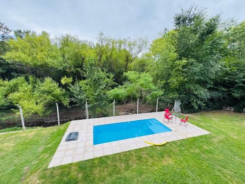 Bazén v ubytování Casa con bajada al Río Potrero de los funes nebo v jeho okolí