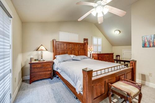 a bedroom with a bed and a ceiling fan at Walkable Miracle Mile Retreat with Peaceful Patio in Stockton