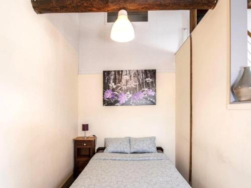 Ένα ή περισσότερα κρεβάτια σε δωμάτιο στο Cozy duplex apartment with terrace