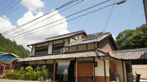 an asian style house with black windows at AMATERASU奈良 一棟貸し切り別荘 nara in Uda