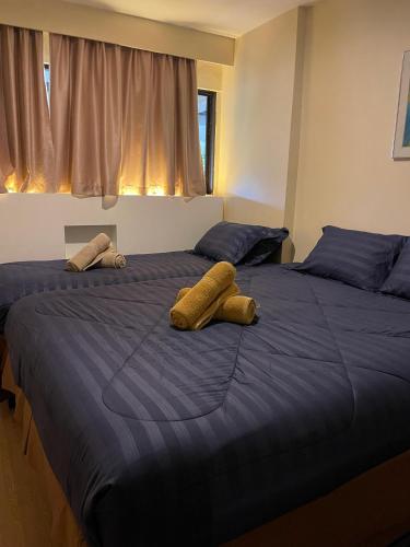 Katil atau katil-katil dalam bilik di The Regency Tanjung Tuan Beach Resort PD by Regency Paradise