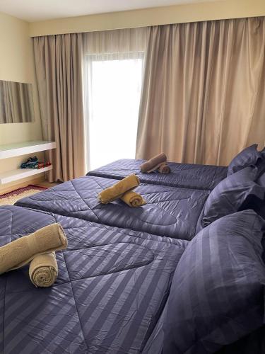 Katil atau katil-katil dalam bilik di The Regency Tanjung Tuan Beach Resort PD by Regency Paradise